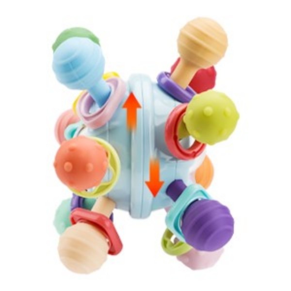 infant developing hand coordination with sensory toy