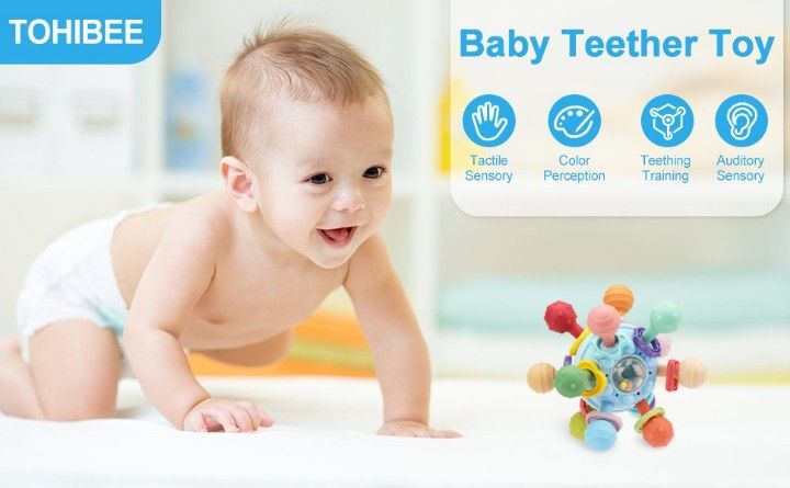 baby exploring colorful Montessori sensory toy